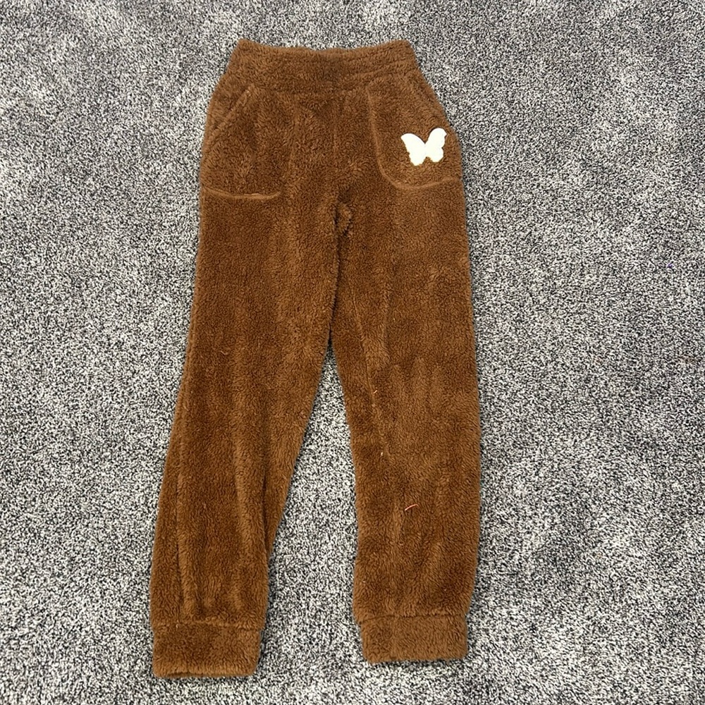 Brown fuzzy pants with butterfly heart on pocket
